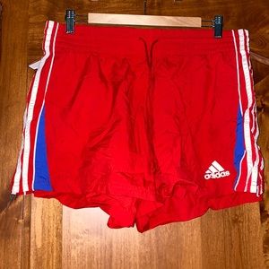 red adidas shorts